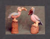 Handmade clay sculpture of fantasy birds