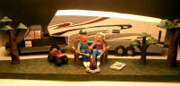 Custom made Retirement Gift...they ran a RV dealership and love the open road.....handamde trailer and pickup..the sculpture is 2 feet long
