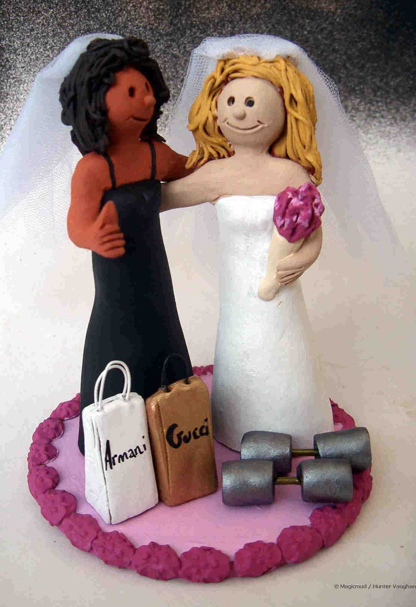 gay wedding cake topper, with their shopping bags and weights