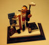 Custom Attorney figurine with scales of justice, his hockey stick, golf clubs, on skates, cigar in mouth