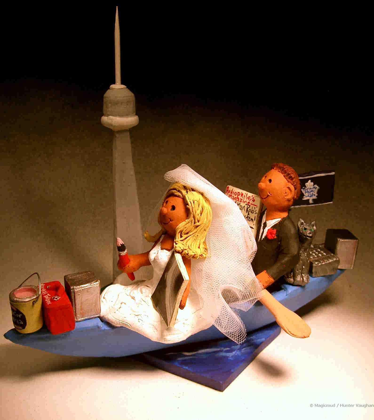 custom kayakers, any concept can be incorporated into your cake topper