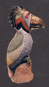 ceramic bird sculpture with multicolored glazes