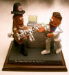 Veterinarian figurine featuring fireman bringing in a dalmation for healing...any pet can be portrayed!