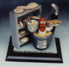 personalized figurine of baker immersed in mixer of dough