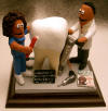 Custom clay caricature of the Dentist and his Assistant working in Dental Harmony...a great gift designed for any Dentist's office!