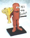 Clay Figurine of Sportsman with His Trophy, any title on it, no charge