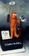  Clay Figurine of Golfer on his desk "teeing off"