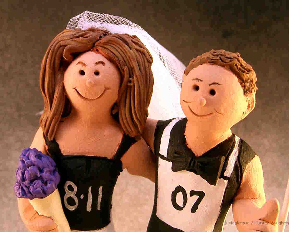 Close up of Runner's Wedding Cake Topper