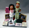 Doctor and Surgeon Wedding Cake Topper Figurine, with wedding photos, medical books, tennis raquet and even the photo of the University they attended in background