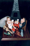 Wedding Bliss in Paris!...Funny Cake Topper with their 2 cats, dog and Eiffel Tower in the background...Quell Grand Souvenier!!