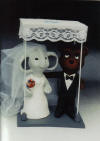 Create a Wedding Cake Topper with Bride and Groom represented as their favorite animals, a statue unlike any other