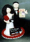 An unusual Wedding Cake Topper can be created for any Couple