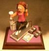 custom sports figurine of her on treadmill with weights, wine and shopping bag, while on the cel!